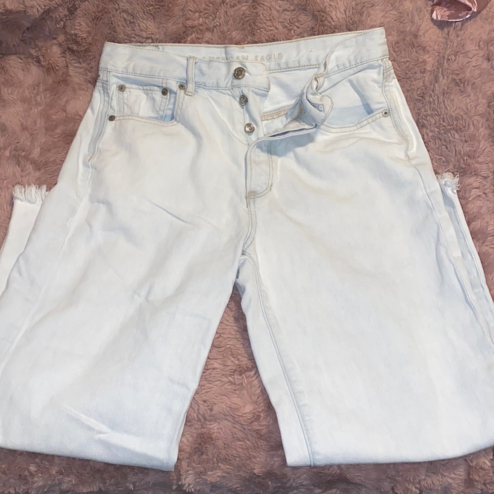 American Eagle mom jeans, distressed on ankles.